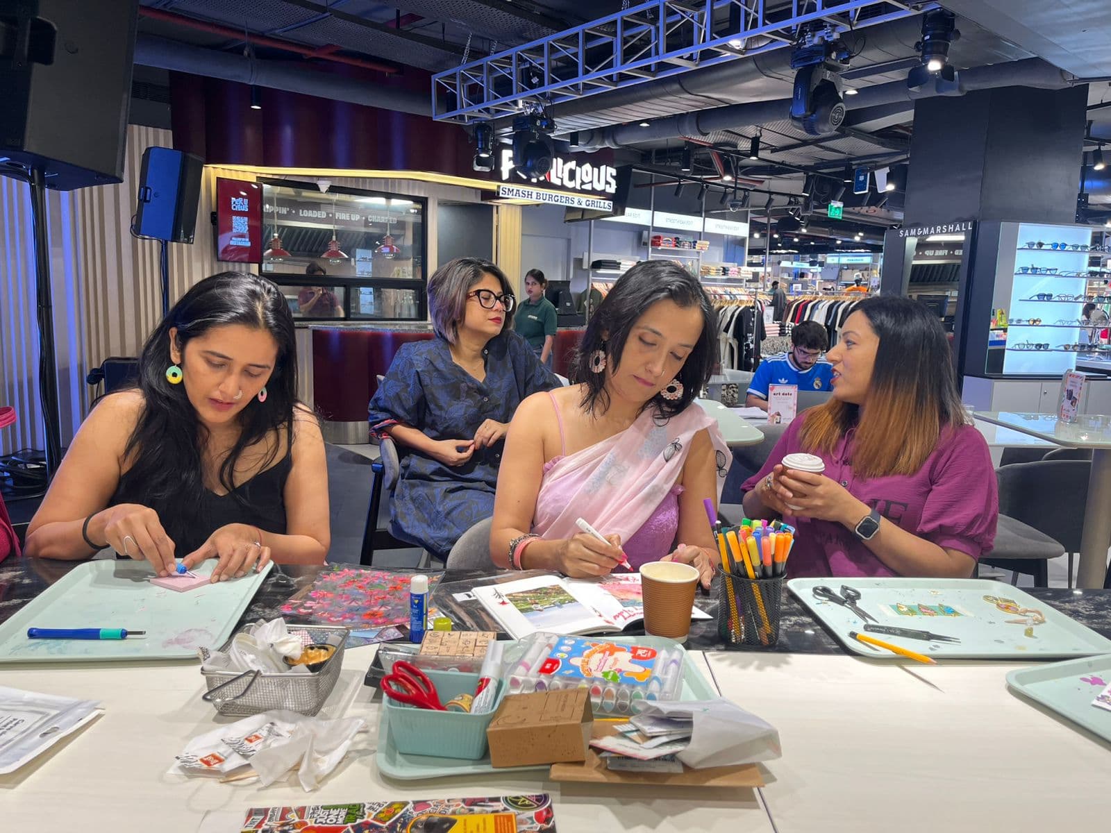 Friends making art together in Delhi