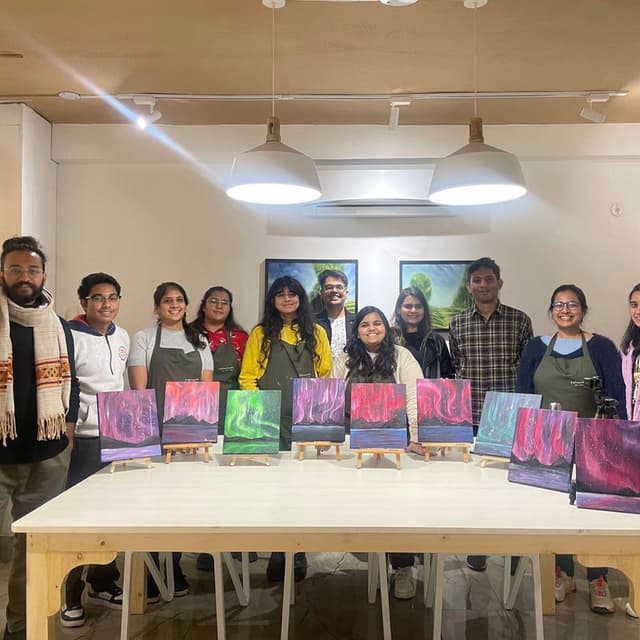 Team canvas painting group photo